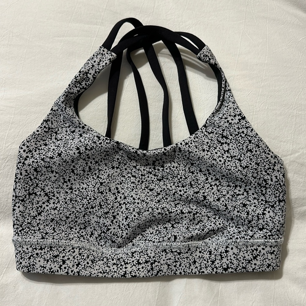 Lululemon Energy Sports Bra 4 black with white flowers Strappy Back Criss Cross